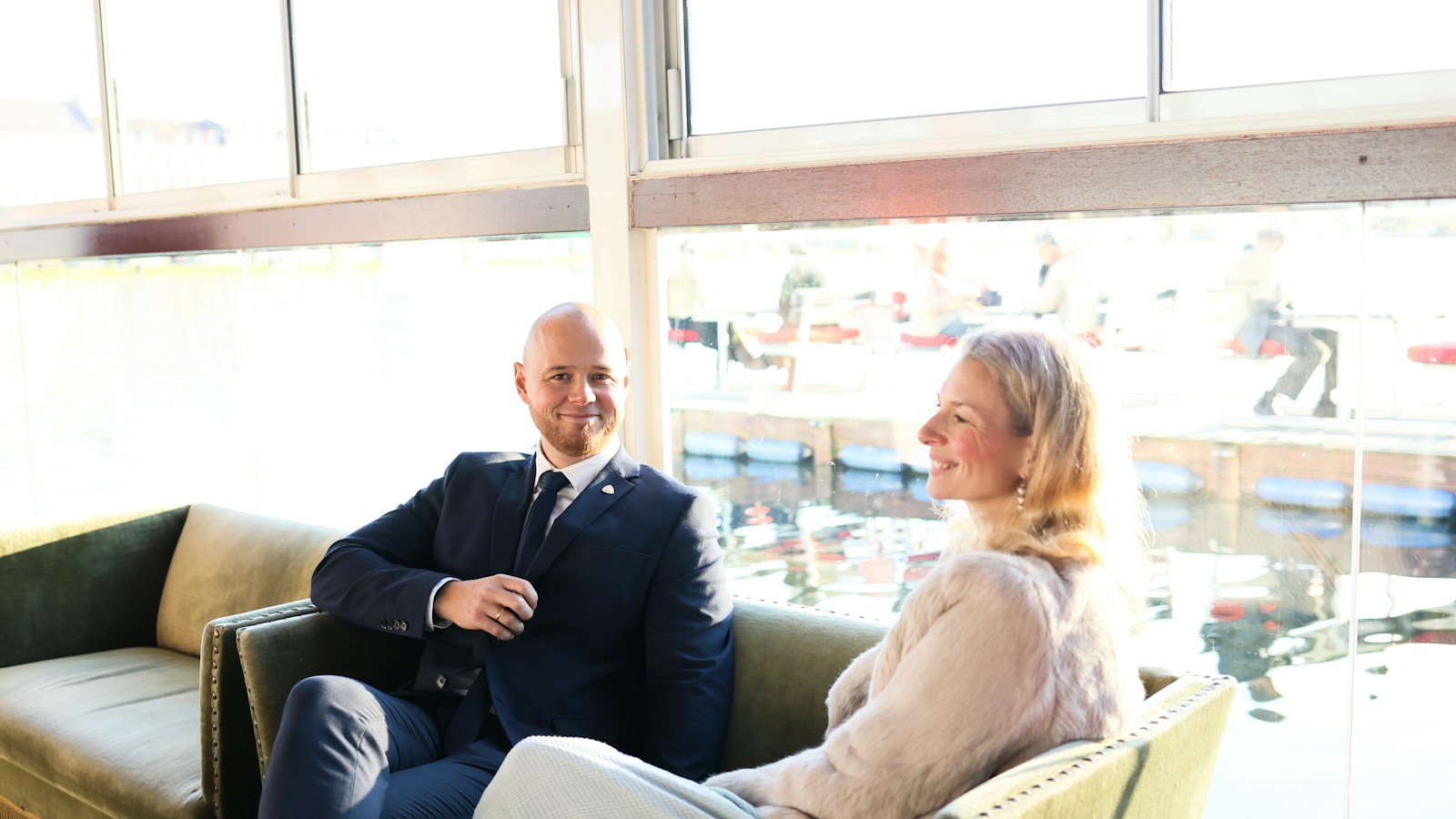 A long-term couple sitting together and reflecting on whether their relationship is love or habit